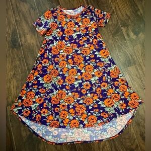 Like brand new. LuLaRoe"Carly " style dress. Longer in back, shorter in front.